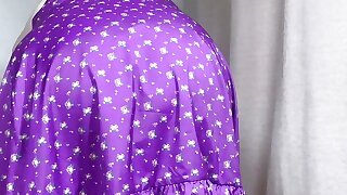 Mature Sally in short lilac skirt, showing off her assets